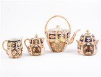 Lot 69 - Davenport Imari pattern three-piece tea set, Imari milk jug and sugar bowl, and cauldron sugar, etc.