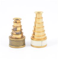 Lot 146 - Two miniature pocket telescopes, one marked. Dolland, and aother pocket scope (2)