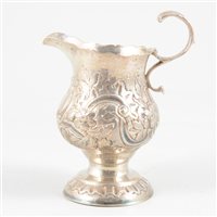 Lot 76 - George III silver helmet-shape cream jug, maker's mark M?, London, 1764.
