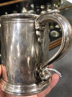 Lot 86 - Queen Anne Britannia Standard mug, Thomas Parr, London, 1704.