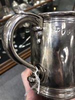 Lot 86 - Queen Anne Britannia Standard mug, Thomas Parr, London, 1704.