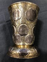 Lot 49 - German silver parcel gilt beaker, set with 18th century coins.