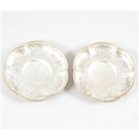 Lot 66 - Pair of Chinese silver tea saucers, Wang Chung of Hong Kong, 1880-1900.