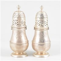 Lot 104 - Pair of Queen Anne Britannia Standard baluster-shape casters, probably Charles Adam, marks rubbed.