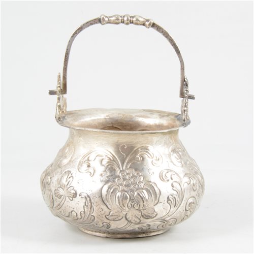 Lot 54 - White metal cauldron-shape bowl with swing handle.