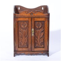 Lot 84 - Edwardian oak smokers cabinet