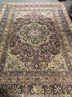 Lot 450 - Tabriz pattern carpet, central medallion on a...