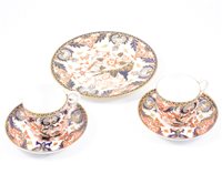 Lot 41 - Two Royal Crown Derby Imari ware teacups and saucers, and a side plate (5)