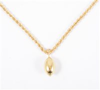 Lot 213 - A 9 carat yellow gold twisted hollow rope link chain 3.8mm gauge, 50cm long, approximate weight 7.5gms with a yellow metal egg shaped pendant attached.