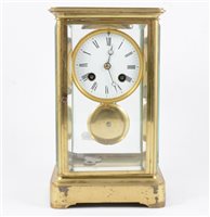 Lot 193 - Brass four glass mantel clock, ...