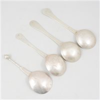Lot 12 - Scandinavian bead top spoon, back engraved 1715; and three Eastern European spoons.