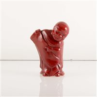 Lot 584 - A Bernard Moore flambé figure of an Oriental figure with scroll