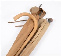 Lot 135 - Three split cane fishing rods and assorted walking sticks