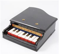Lot 156 - A Mini piano and xylophone, together with a vintage umbrella