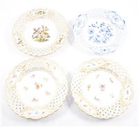 Lot 49 - A set of four Meissen plates