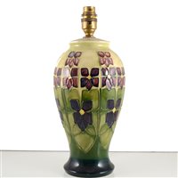 Lot 540 - A Moorcroft Pottery lamp base, 'Violet' designed by Sally Tuffin.