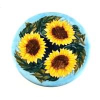 Lot 534 - A Moorcroft Pottery charger, ‘Sunflower’ designed by Sally Tuffin.