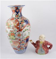 Lot 44 - A large Imari vase, 45cm, Doulton Series Ware "Rustic England" pedestal bowl 19.5cm diameter, small Aynsley fruit dish by D Jones 14cm diameter and a Lingard "Mr Pickwick" teapot (4)