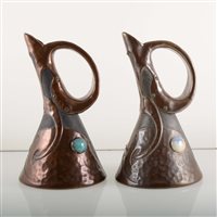 Lot 525 - Two similar Bretby Pottery ewers, circa 1900