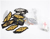 Lot 248 - A quantity of Morgan car badges, valve caps, and embroidered badges