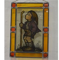 Lot 303 - Small stained glass window depicting a whistling boy