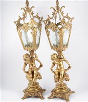 Lot 163 - Pair of reproduction gilt metal mantel lanterns