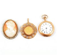 Lot 265A - A 10th Krugerrand in a 9 carat yellow gold pendant mount, an oval carved shell cameo in a metal brooch mount, small gold coloured fob watch.