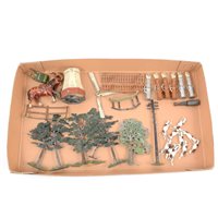 Lot 87 - Lead painted figures, including Britains hunting hounds, Britains trees, Pixieland Pratts petrol pumps, etc.