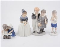 Lot 23 - Four Royal Copenhagen figures of children - young girl in long dress 1251 20cm