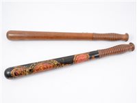 Lot 180 - A Warwickshire Constabulary decorated truncheon, painted in red and gold, with ribbed grip, 44cm, and another plain truncheon, 44cm with similar grip. (2)