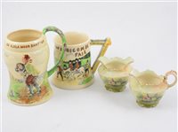 Lot 80 - A set of three Crown Devon pheasant jugs, a similar milk jug with pewter cover and a small milk and sugar