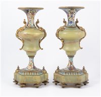 Lot 91 - A pair of green marble and cloisonne enamel garnitures, vase shaped candleholders each standing on six enamel feet, 32cm high.