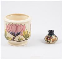 Lot 11 - Moorcroft jardiniere and small baluster vase. (2)