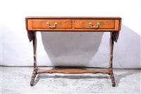 Lot 383 - A Georgian style walnut sofa table