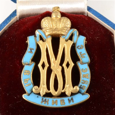 Lot 271 - A Russian enamel monogrammed badge, bearing the Imperial cipher of Empress Maria Feodorovna