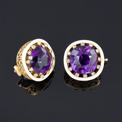 Lot 264 - A pair of Fabergé amethyst and diamond lapel brooches
