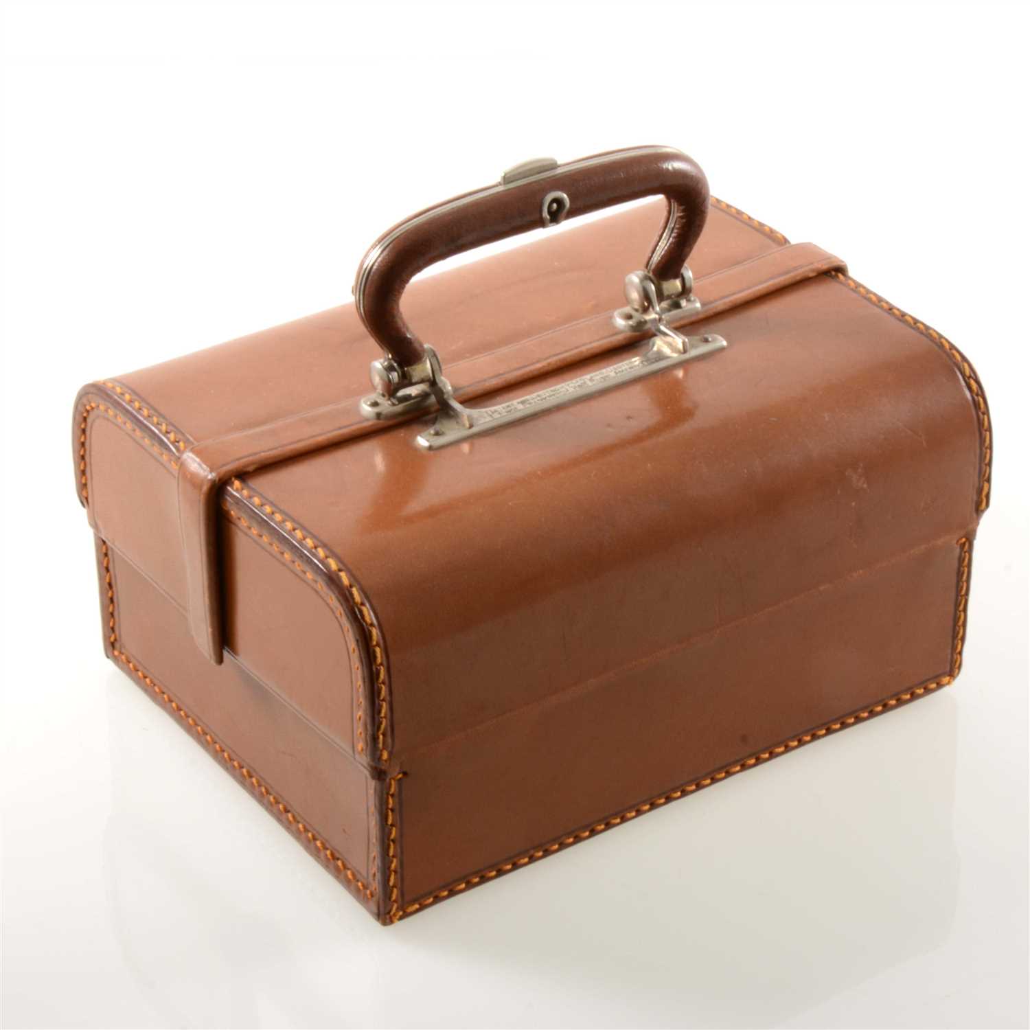 Lot 272 - A tan leather jewellery case with lift out tray