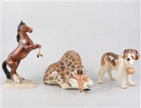 Lot 67 - A collection of Beswick and other china horses and animals, including Beswick black and white horse, 'Bosun' bulldog and 'Robin' 980, Lomonosov giraffe and JEMA Holland Bassett Hound. (20)