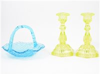 Lot 76 - A collection of decorative glassware, including a pair of lemon tinted glass candlesticks, other press moulded glassware.