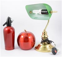Lot 98 - A vintage style brass desk lamp, 27cm, Sparklets soda syphon, similar ice bucket, and gilt metal figures.