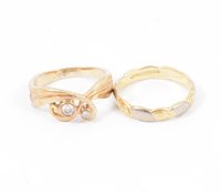Lot 186 - An Isle of Mull diamond ring collet set with two brilliant cut diamonds