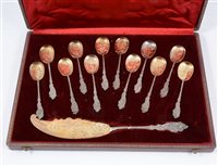 Lot 239 - French silver-gilt thirteen piece dessert set.