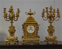 Lot 141 - French cast brass three-piece garniture