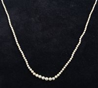 Lot 249 - A pearl necklace, one hundred and thirty-five pearls graduating from 2.3mm to 5.2mm and knotted every pearl into a single strand 48cm long