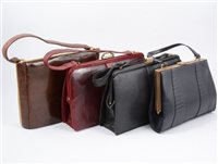 Lot 172 - A collection of vintage handbags, including snakeskin effect in black, burgundy and natural, an evening bag with paste and gilt clip and a Van Dal leather handbag. (9)