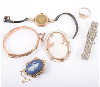 Lot 244 - A collection of vintage jewellery, an oval carved shell cameo 45mm x 35mm, classical bust in a rose metal mount
