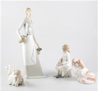 Lot 23 - Royal Copenhagen model of a Spaniel, No. 1772, 12cm; other Copenhagen models,  a Danish porcelain dish, a Nao figure, another Spanish model and other figurines