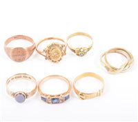 Lot 246 - Seven yellow metal dress rings, a 18 carat yellow gold buckle ring approximate weight 2.8gms