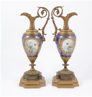 Lot 90 - A pair of French Sevres style garniture ewers (2)