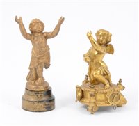 Lot 118 - Two gilt metal putti, originally mounts of furniture/ clocks.